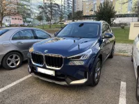 BMW X1 Phytonicblau X1 of LazyDriver
