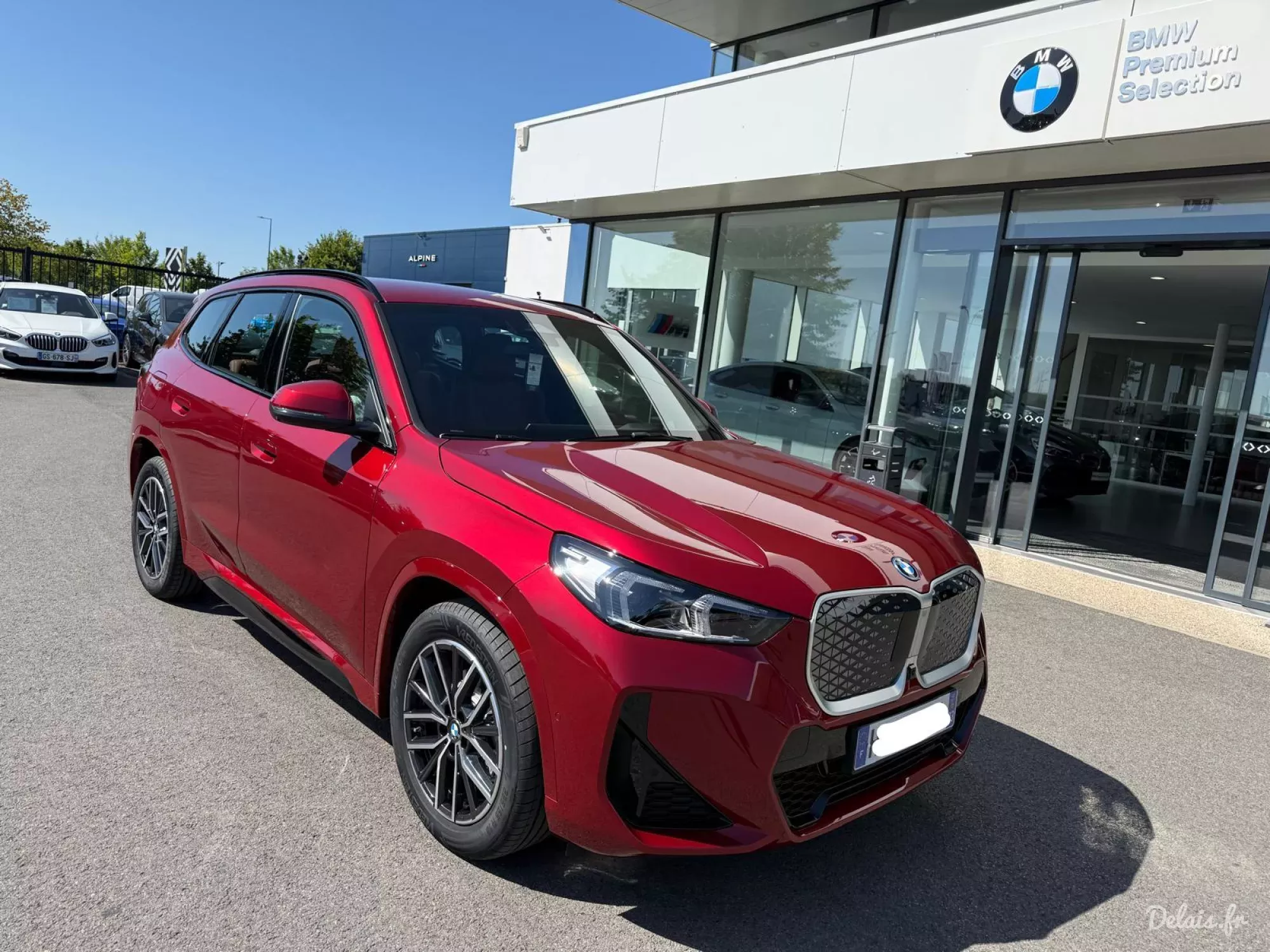 BMW iX1 Fire Red M Sport