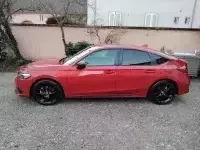 Honda Civic Rouge Cristallin Premium Sport de François